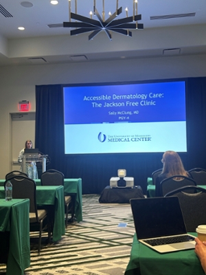 Sarah McClees Speaking at symposium